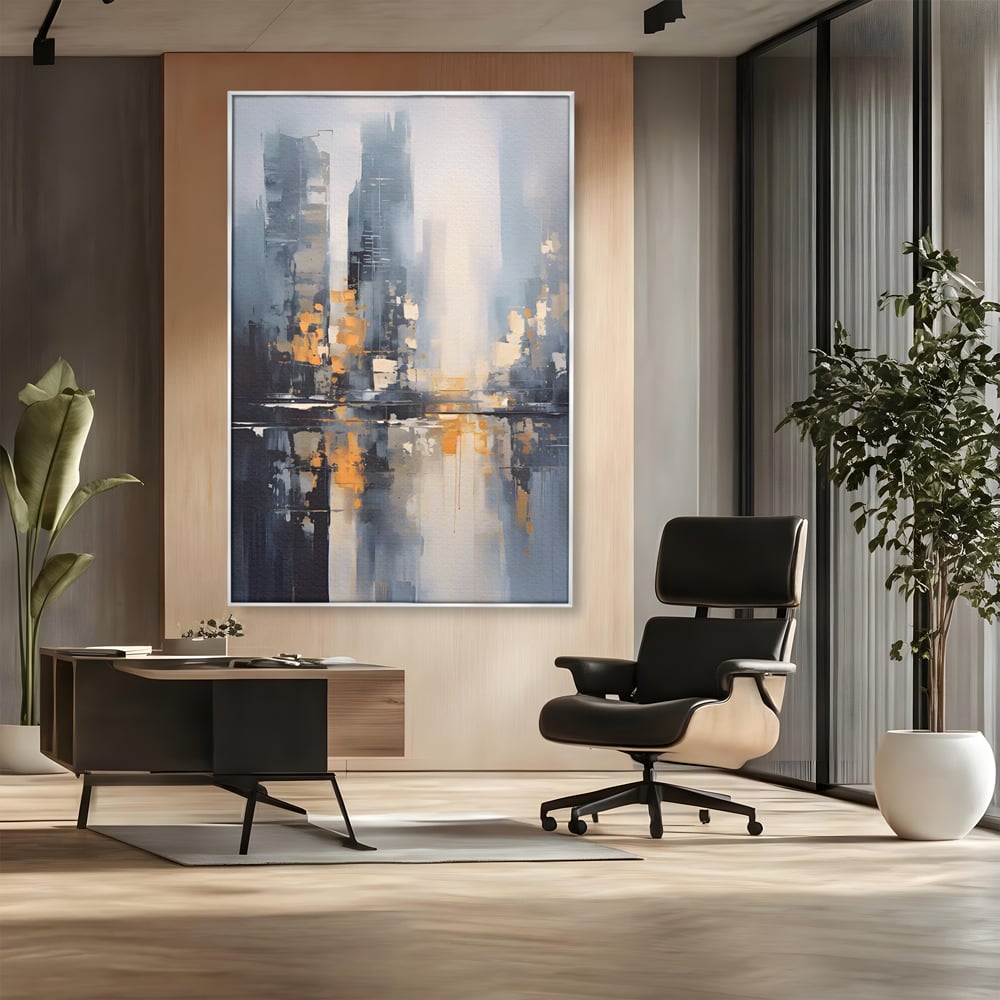 Tablou canvas cu pictura abstracta cu cladiri si reflexii, in rama de aluminiu argintiu, pe perete intr-un birou